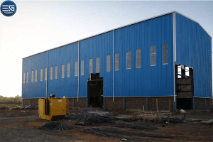 Turnkey industrial construction in Egypt 2026 : Large-scale steel hangar for agricultural processing with heavy-duty civil foundations.